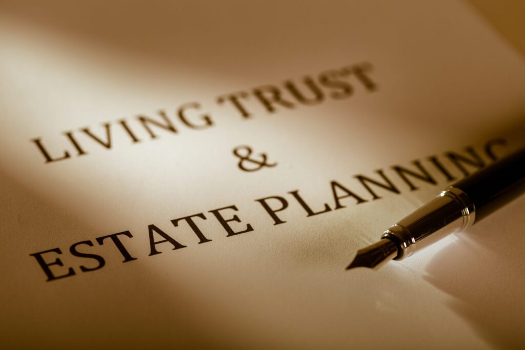 Close-up of a document titled "Living Trust & Estate Planning" with a fountain pen resting on it, essential for those considering LaGrange Park Trusts.